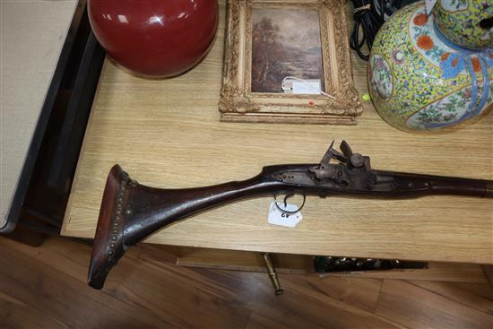 An early 19th century Persian Jezail flintlock musket length 149cm